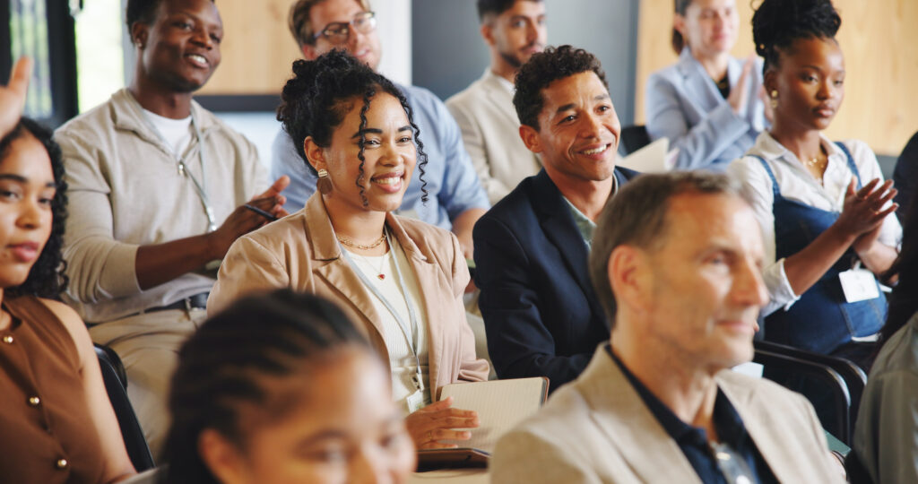 Sales professionals at a leadership development seminar